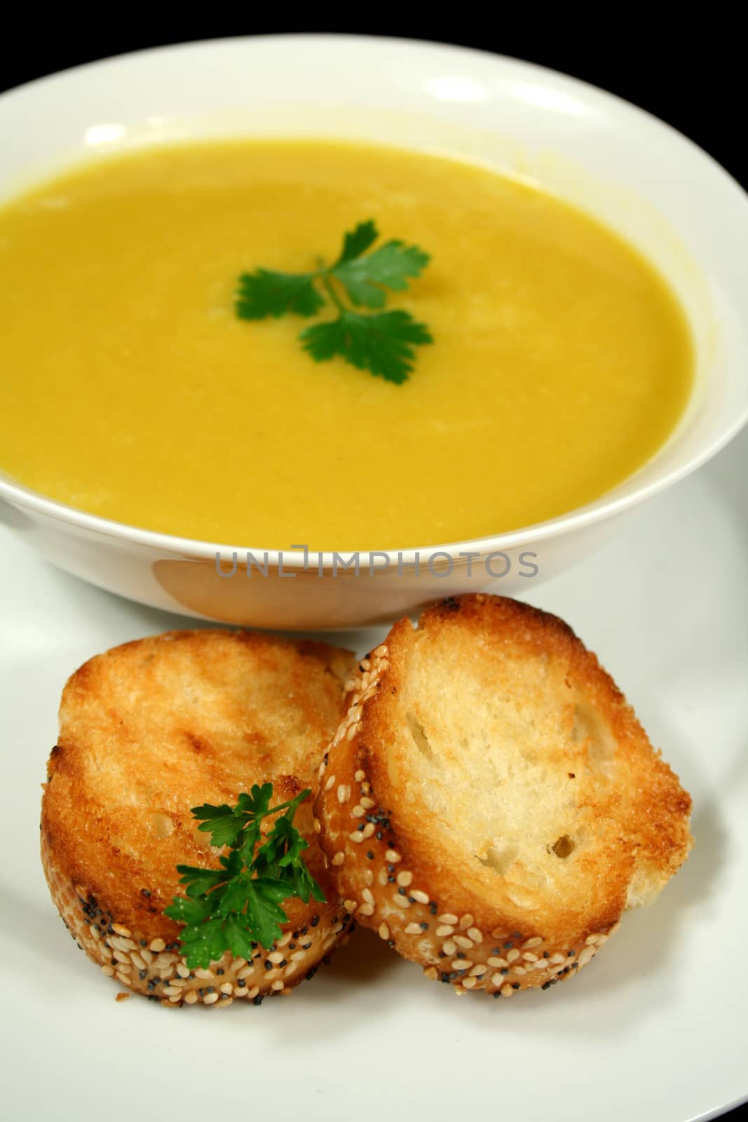 Piping hot pumpkin soup with garlic infused crusty bread.