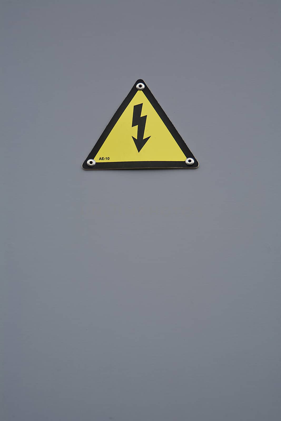 Signal of danger of electrocution from high voltage isolated in grey