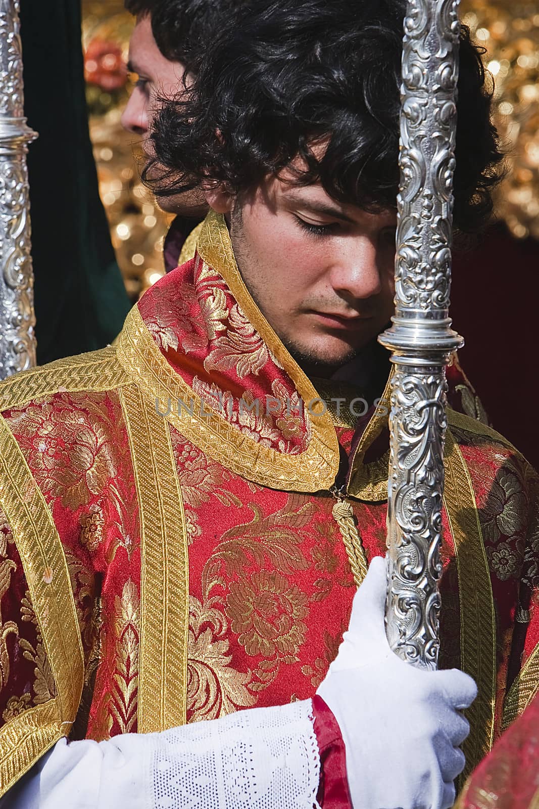 Dalmatic man dressed in a procession during Holy Week, Andalucia, Spain