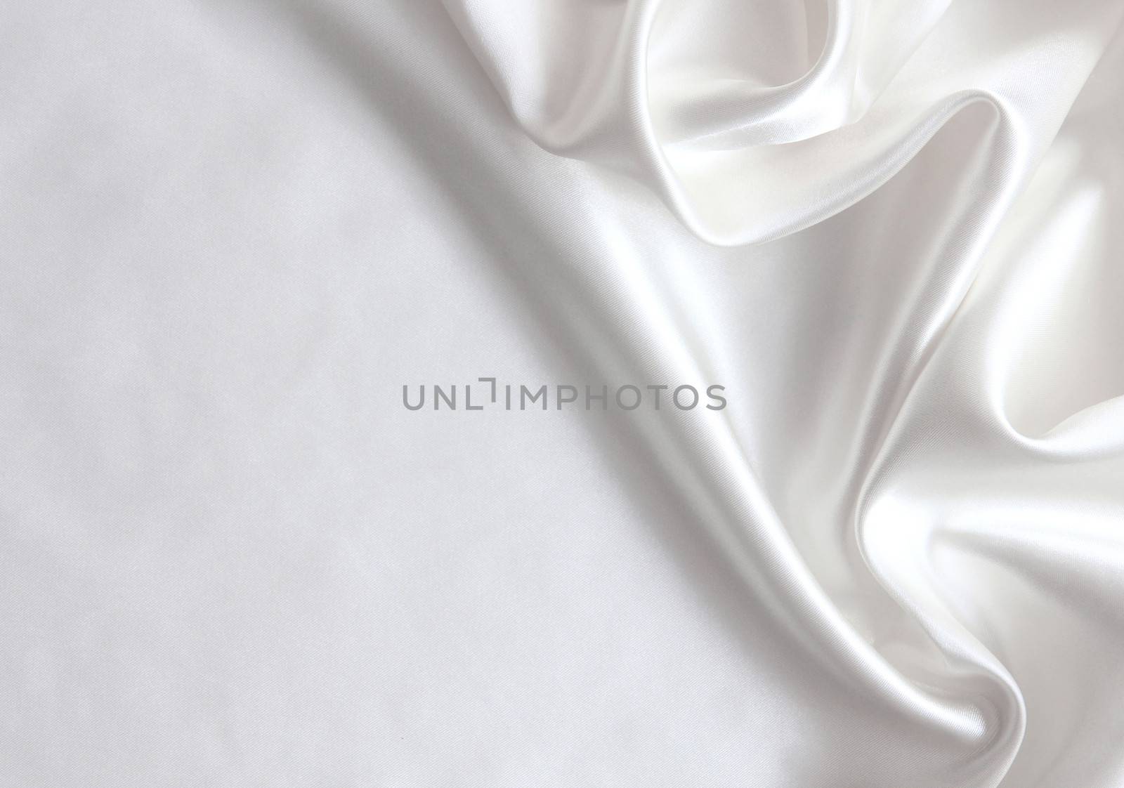 Smooth elegant white silk can use as wedding background 