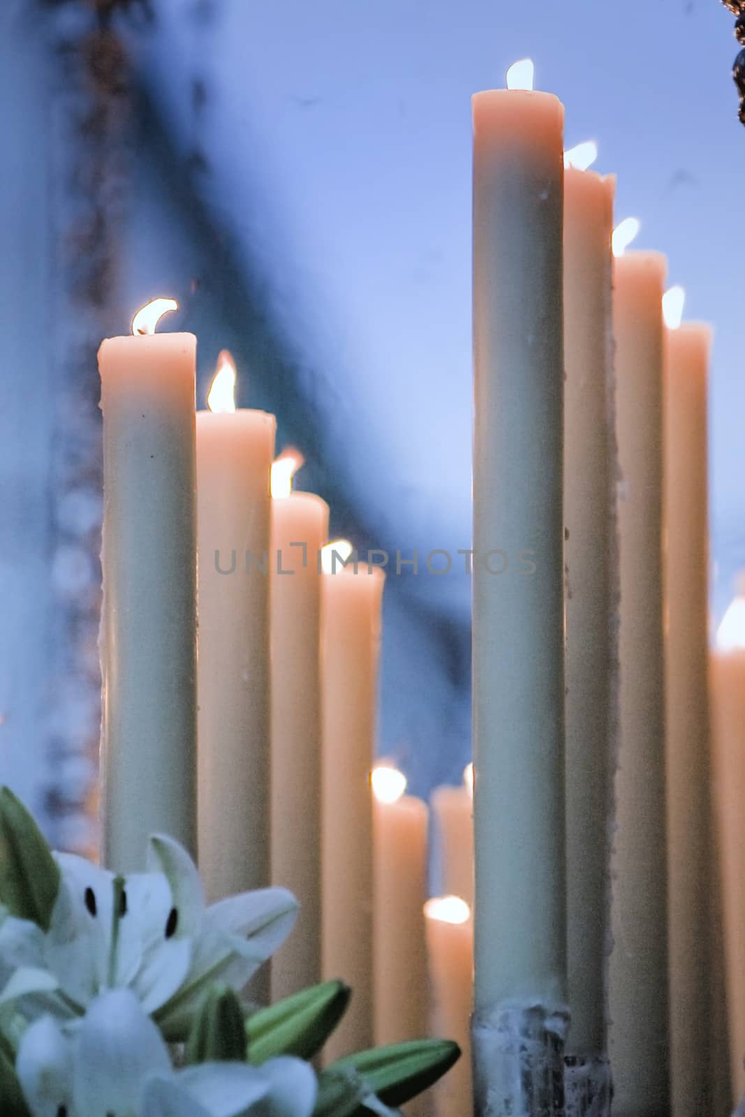 Close up view of the candles cutting through the darkness