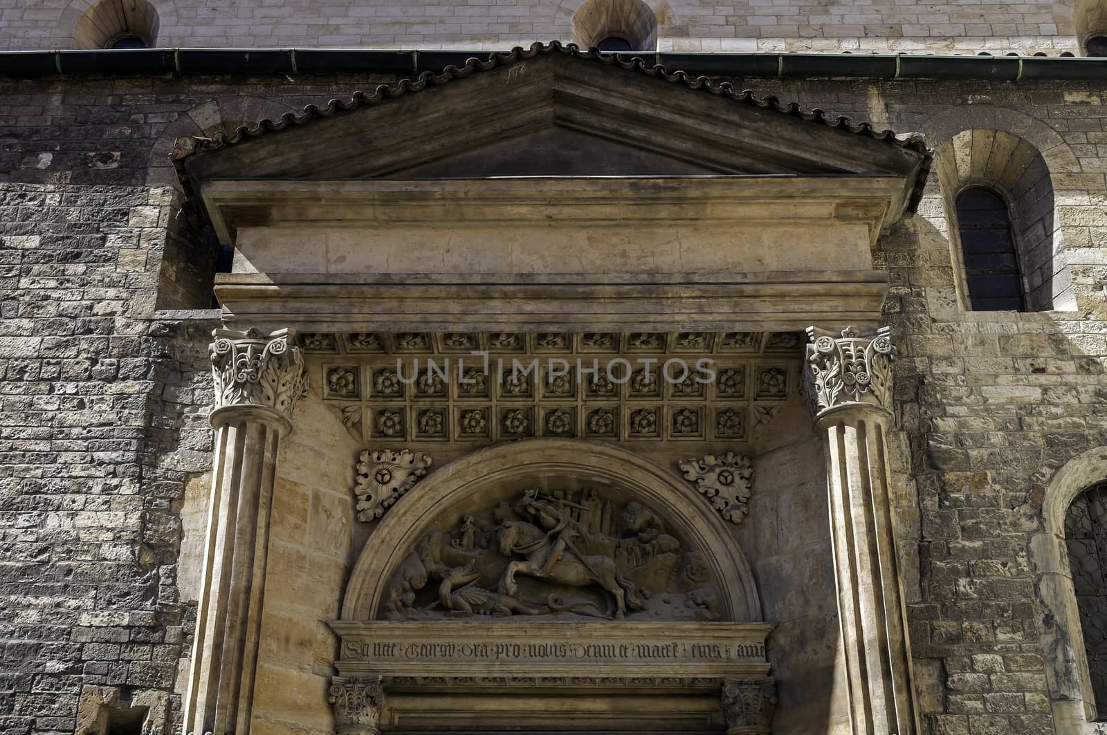 Fight with the dragon. Medieval architecture detail at St. George's Basilica, Prague, Czech Republic.