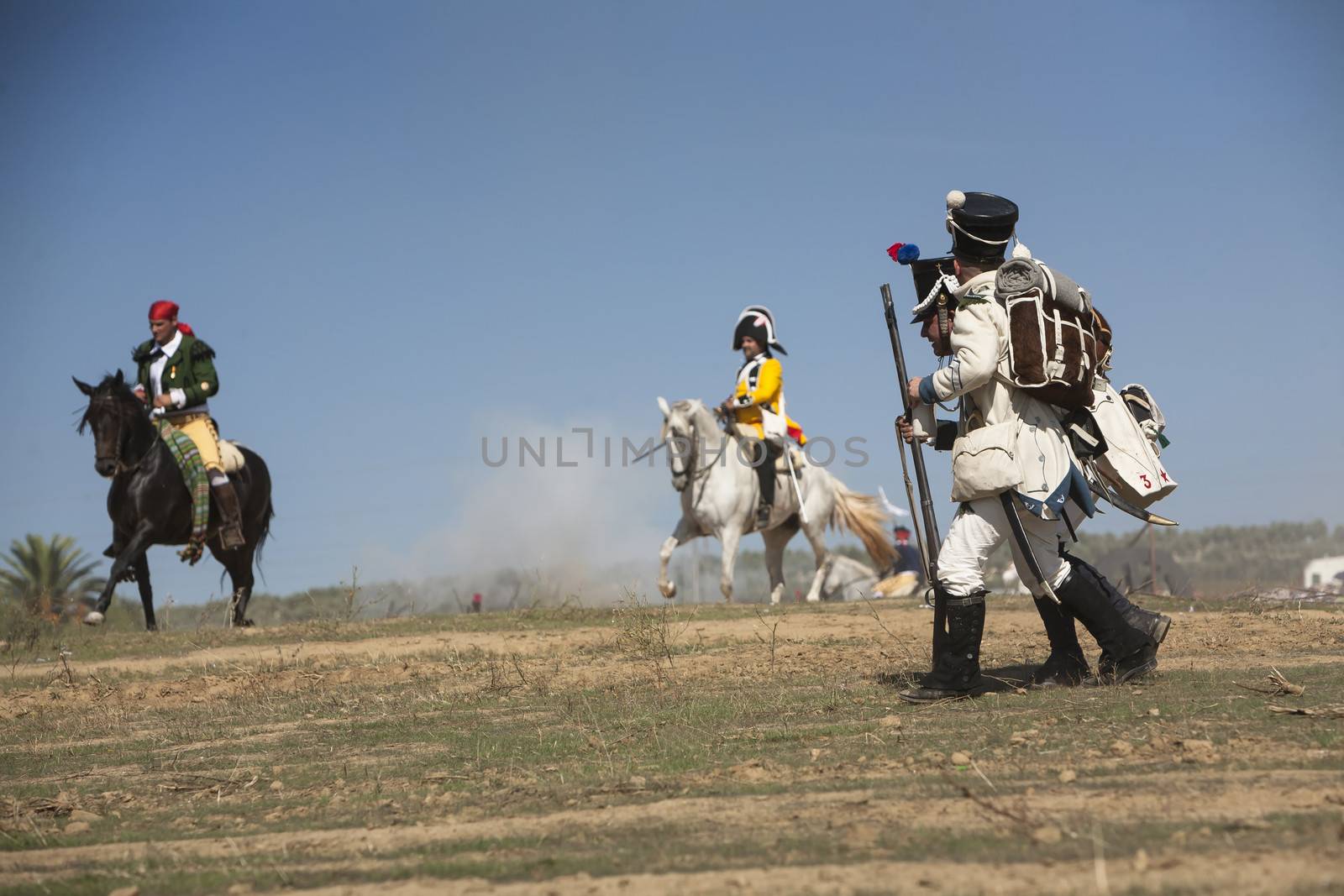 Two French soldiers wounded in combat are fleeing the battlefield in Representation of the Battle of Bailen, Bailen  Jaen province, Andalusia, Spain