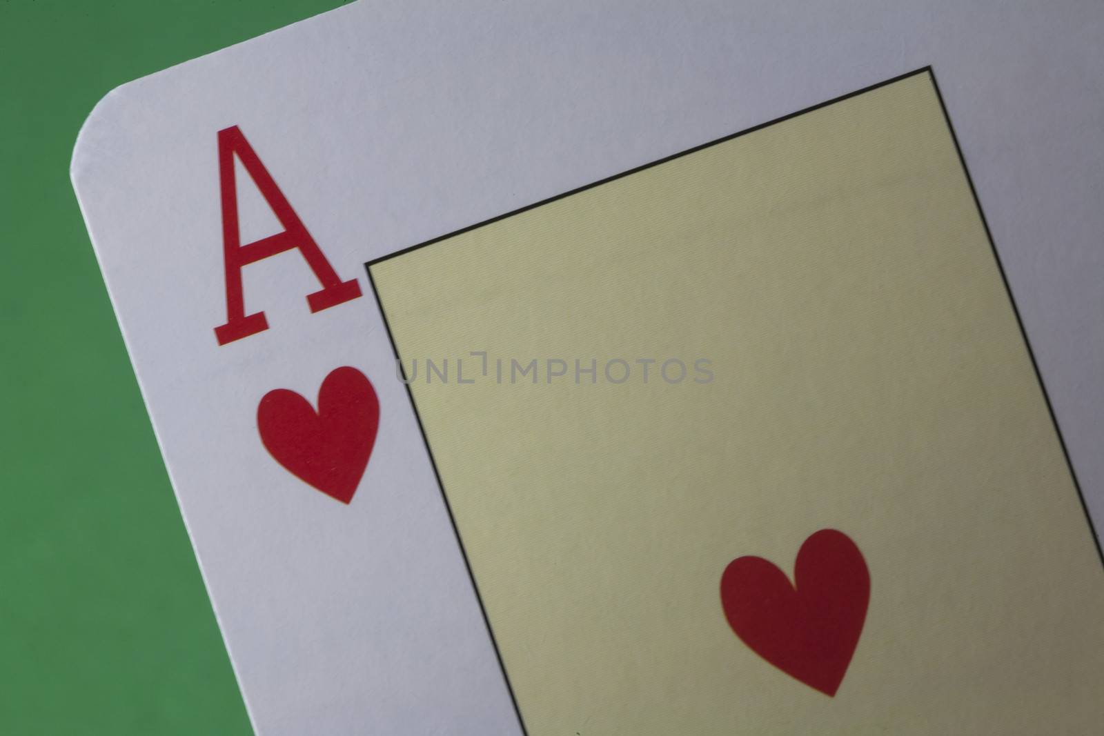 Ace of hearts on green felt