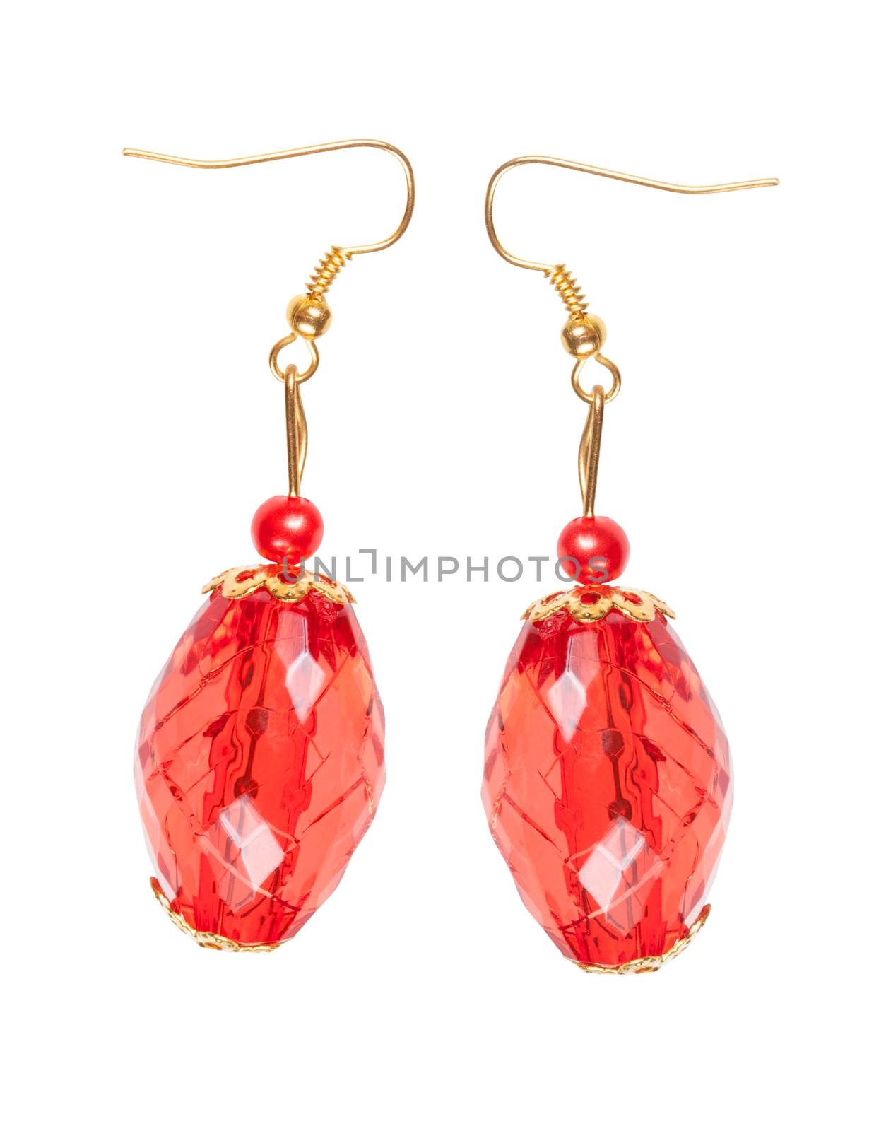 Earrings in red glass with gold elements isolated on a white background. Collage.