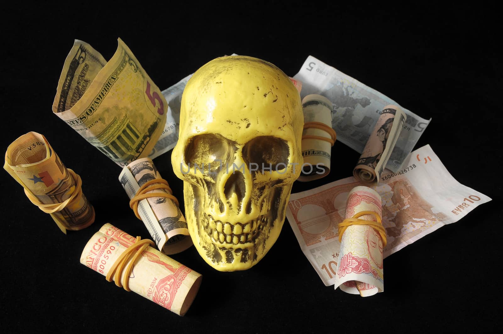 Death Money Concept Skull and Currency over a Black Background
