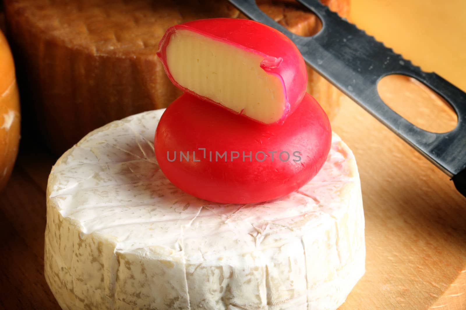 stack of different types of cheese 