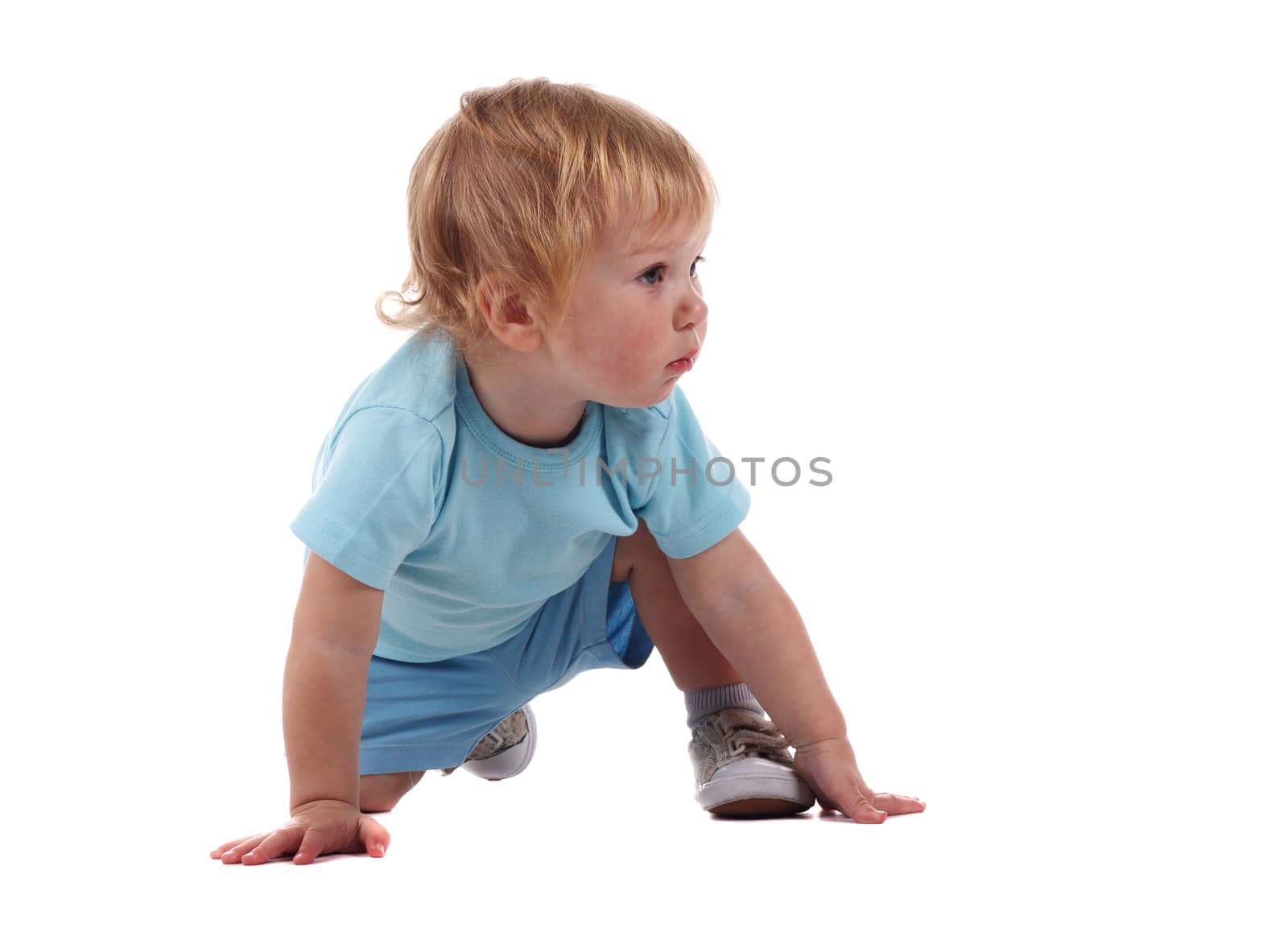 A little boy on all fours isolated on the white