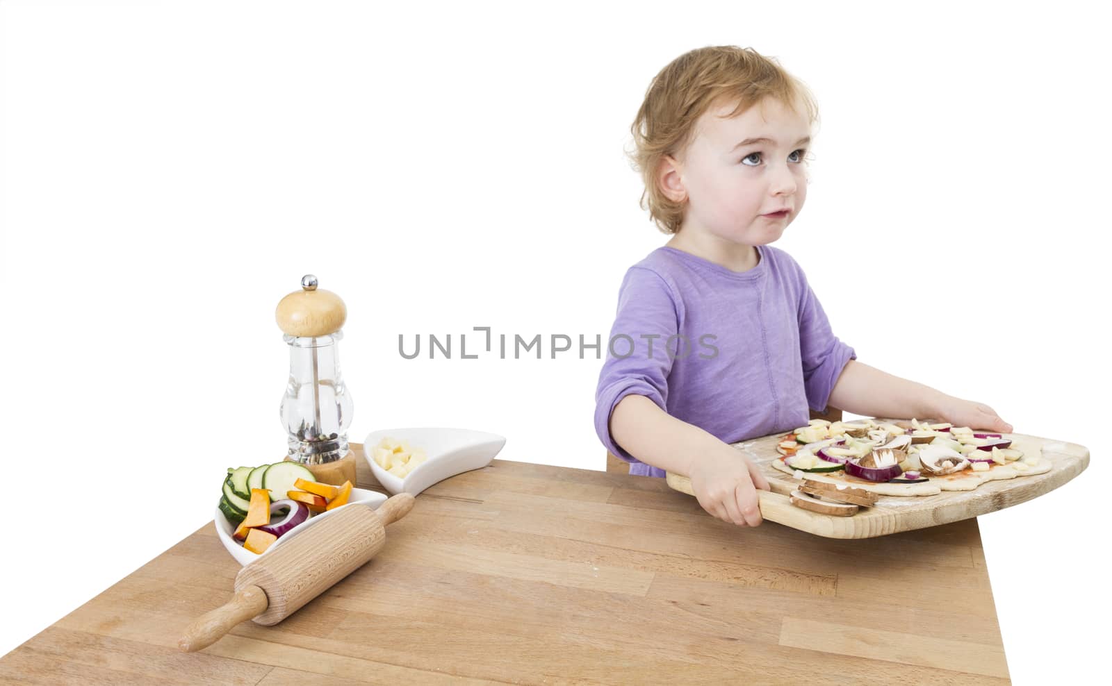 child with home made pizza. studio shot isolated on white background