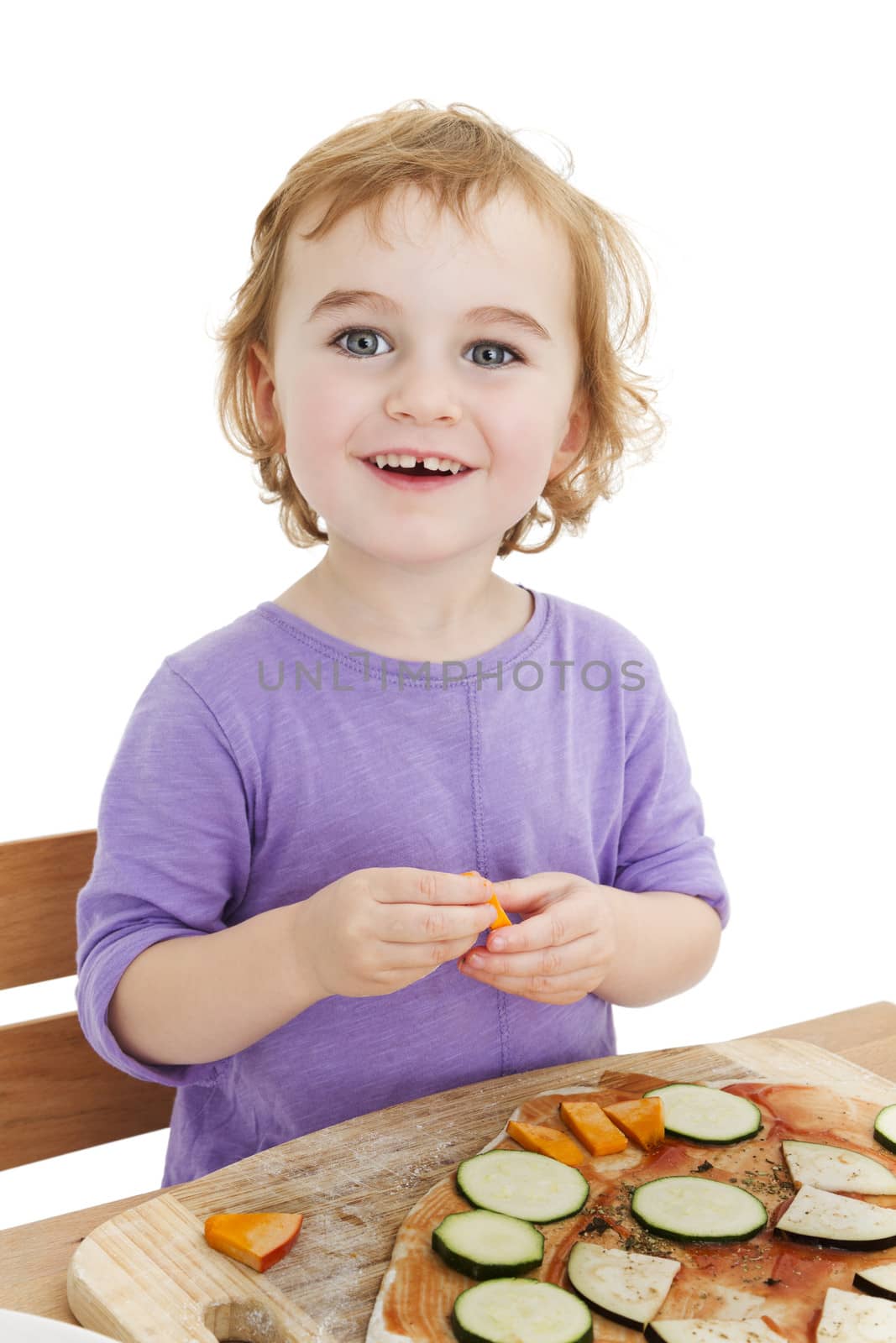 cute laughing girl making pizza. isolated in white background