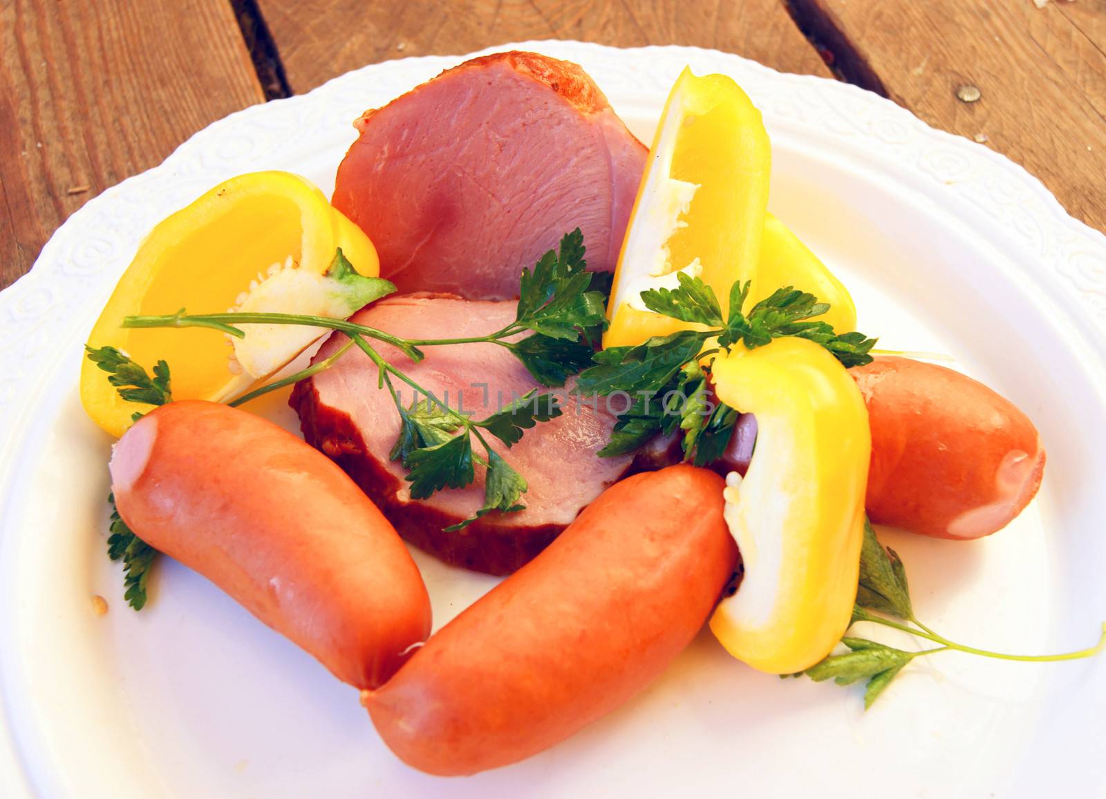 Hot dogs and salad on white background is insulated