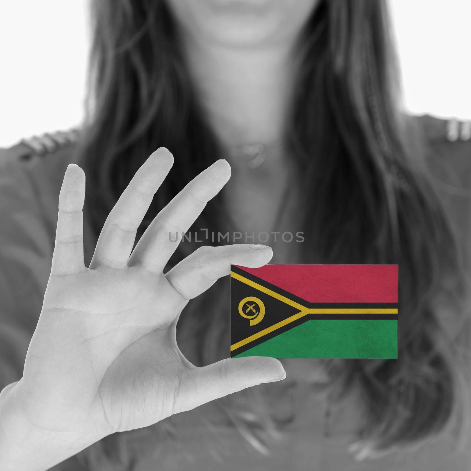 Woman showing a business card, flag of Vanuatu