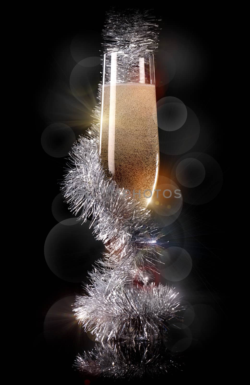 Glass of champagne with beautiful Christmas decorations