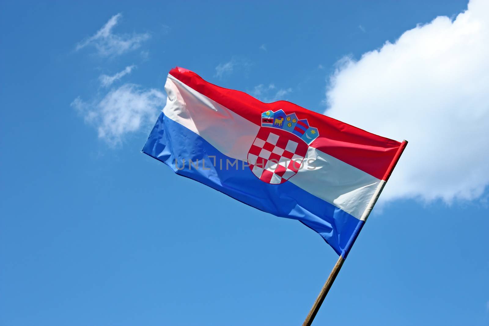 Croatian flag in front of the blue sky