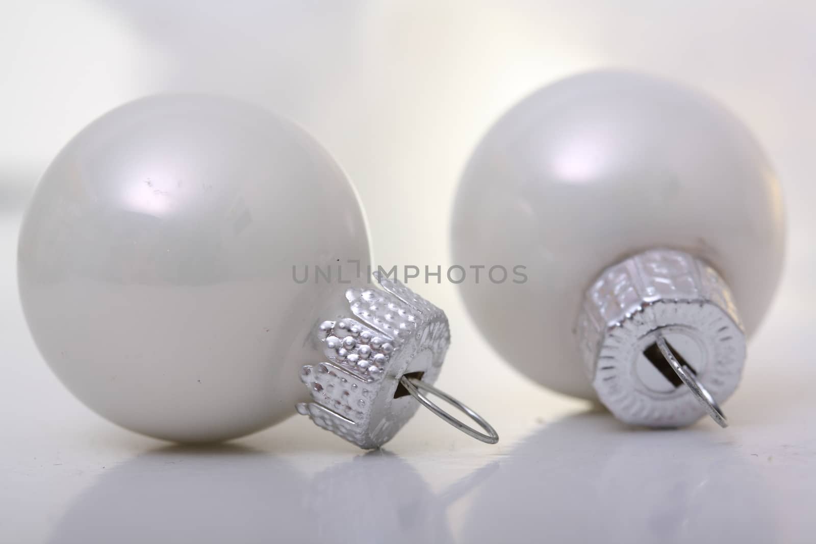 white christmas balls with white background 