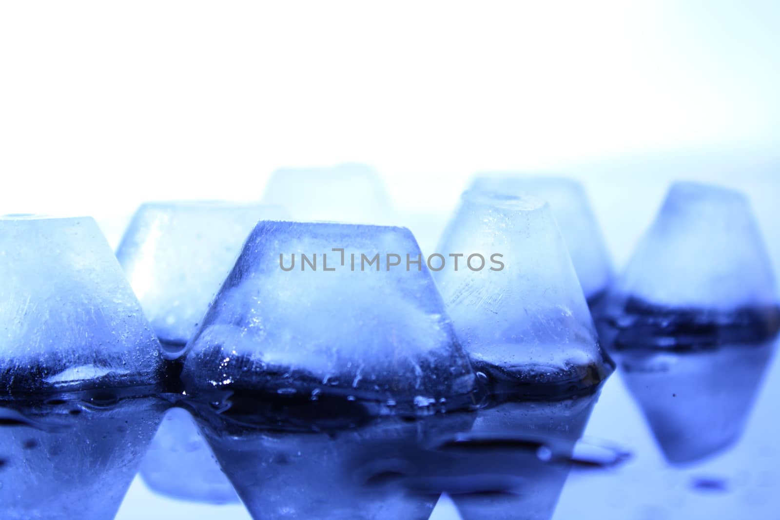 several ice cubes in the form of ground without background 