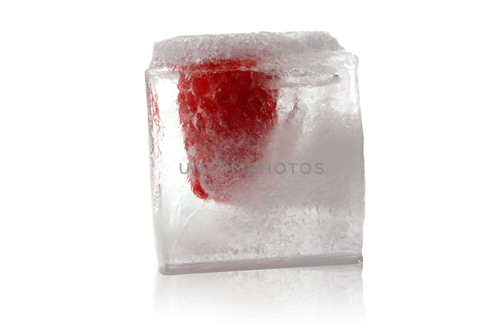 Raspberry frozen in ice cube 