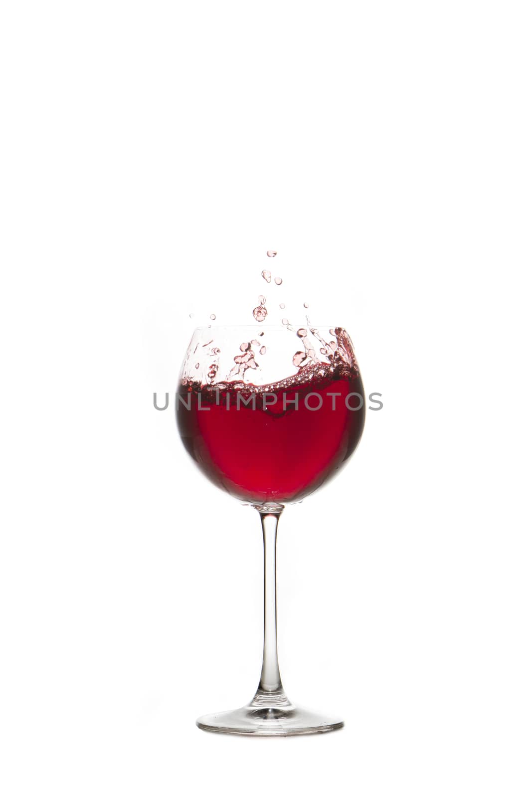 Red wine splash Glass with white background