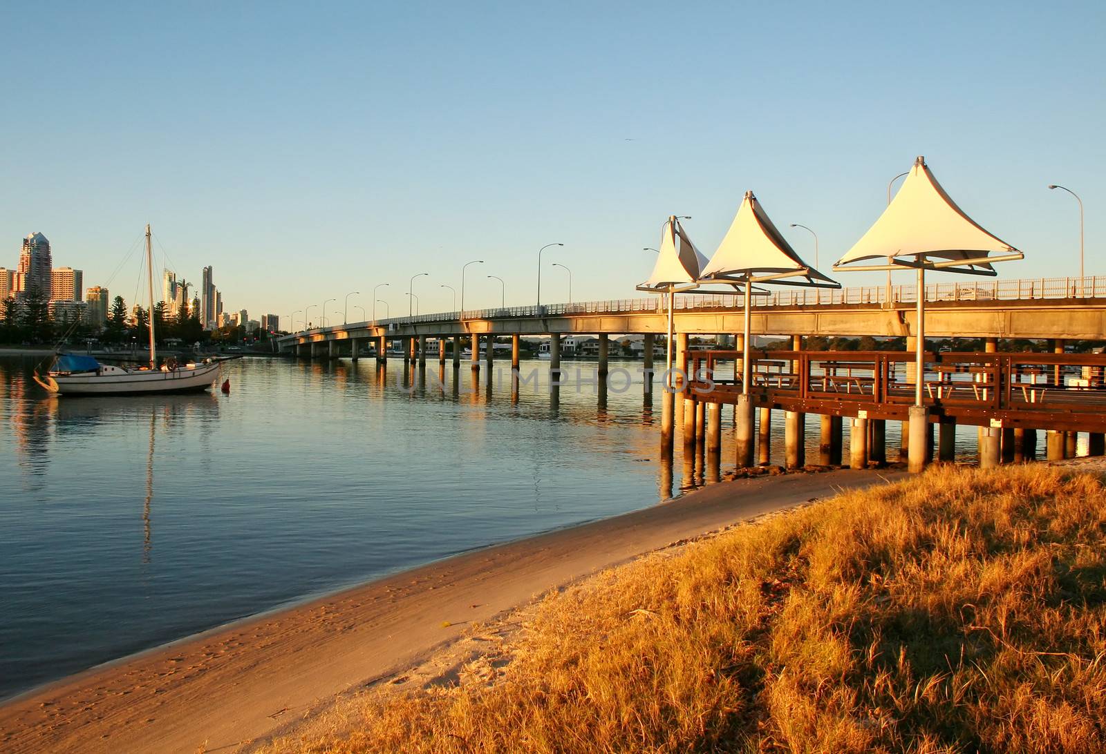Shade sails at dawn at Southport Gold Coast Australia at the Sundale Bridge looking toward Surfers Paradise.