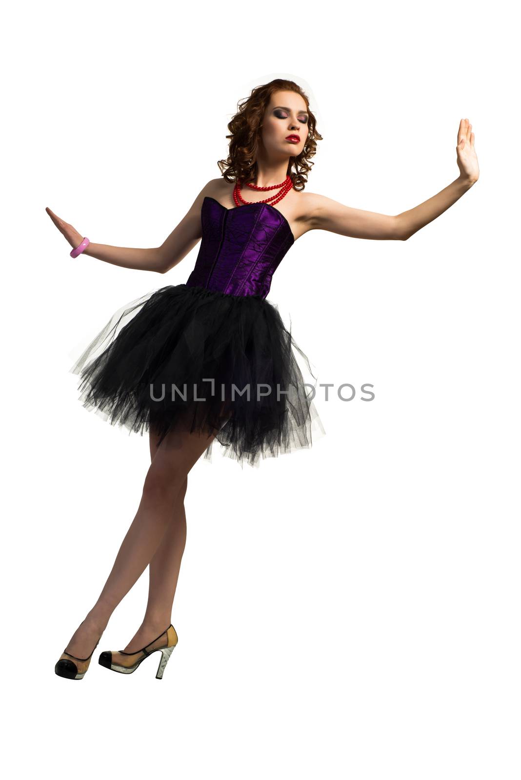 young attractive woman dancing in a transparent dress