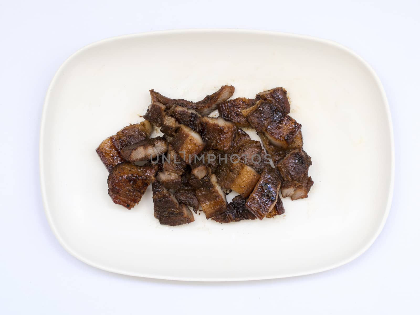 grilled barbecued pork on a plate