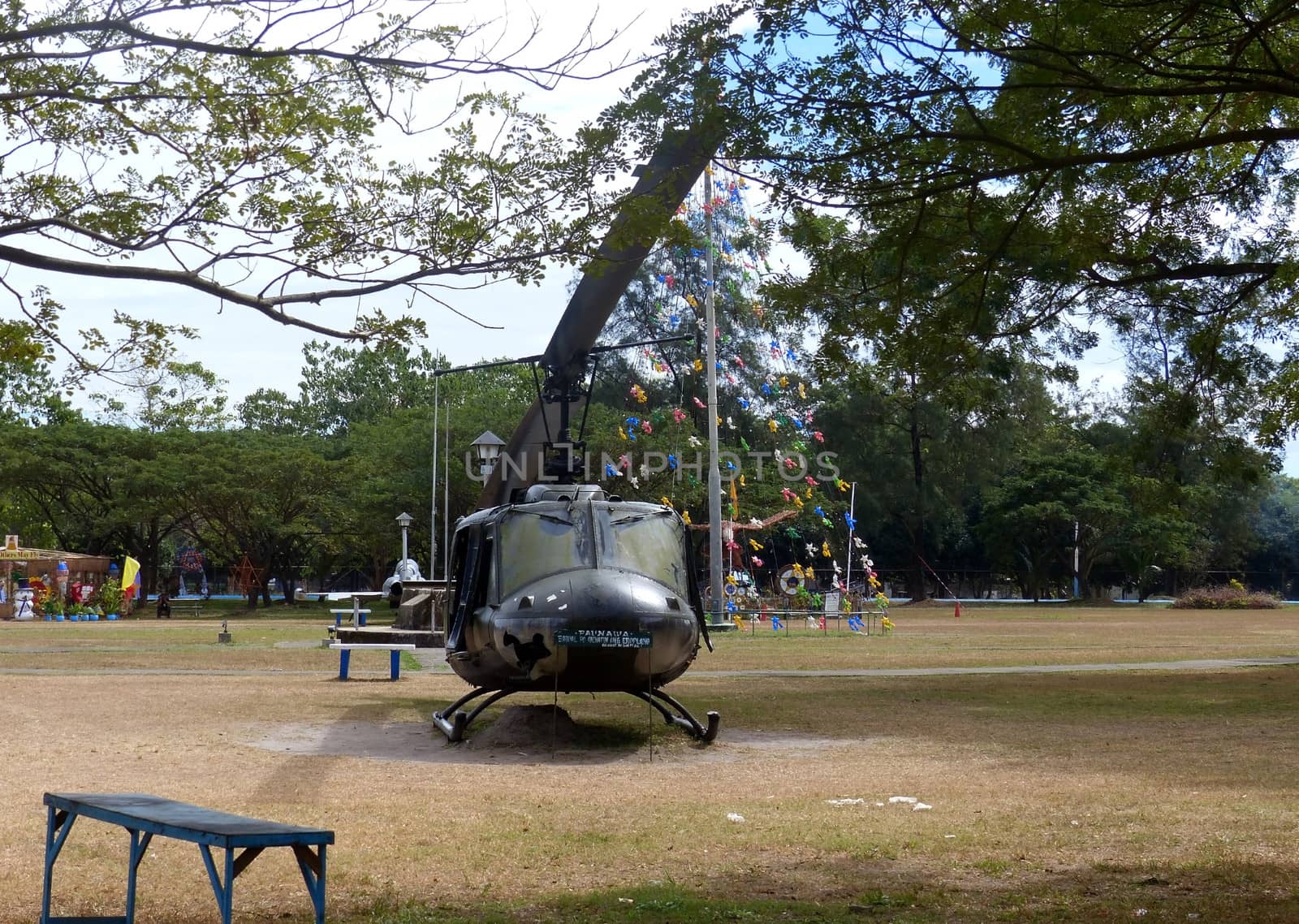 helicopter parked in a field
