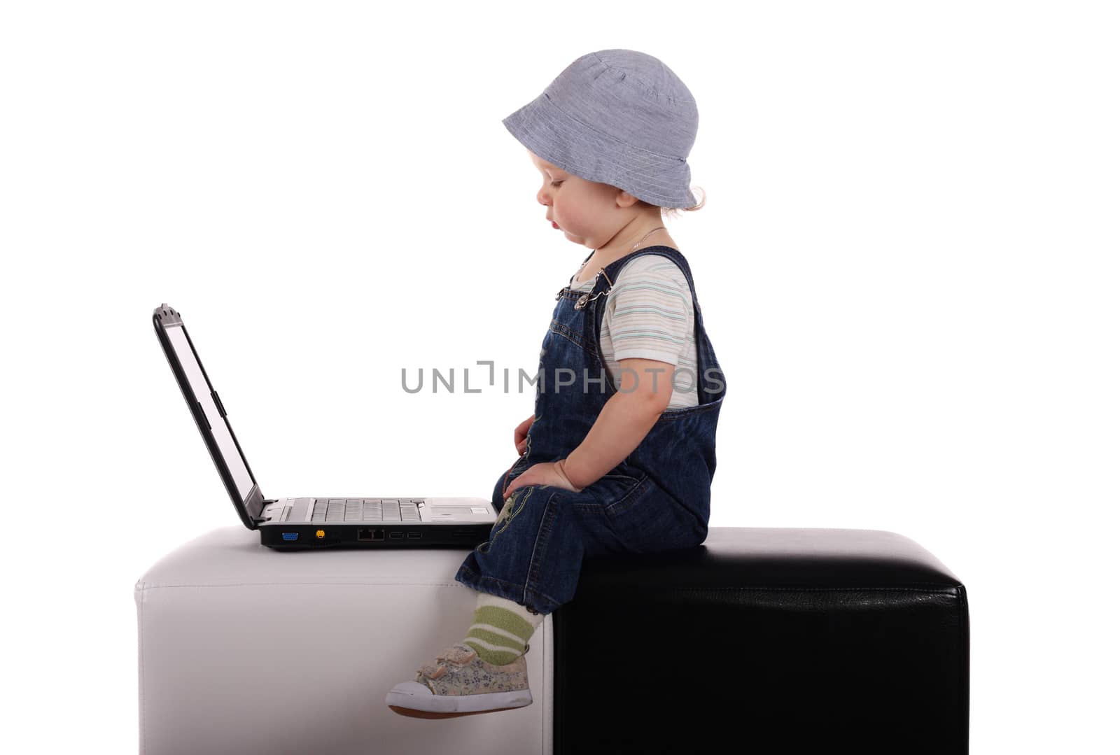 Little boy with a laptop by dedmorozz
