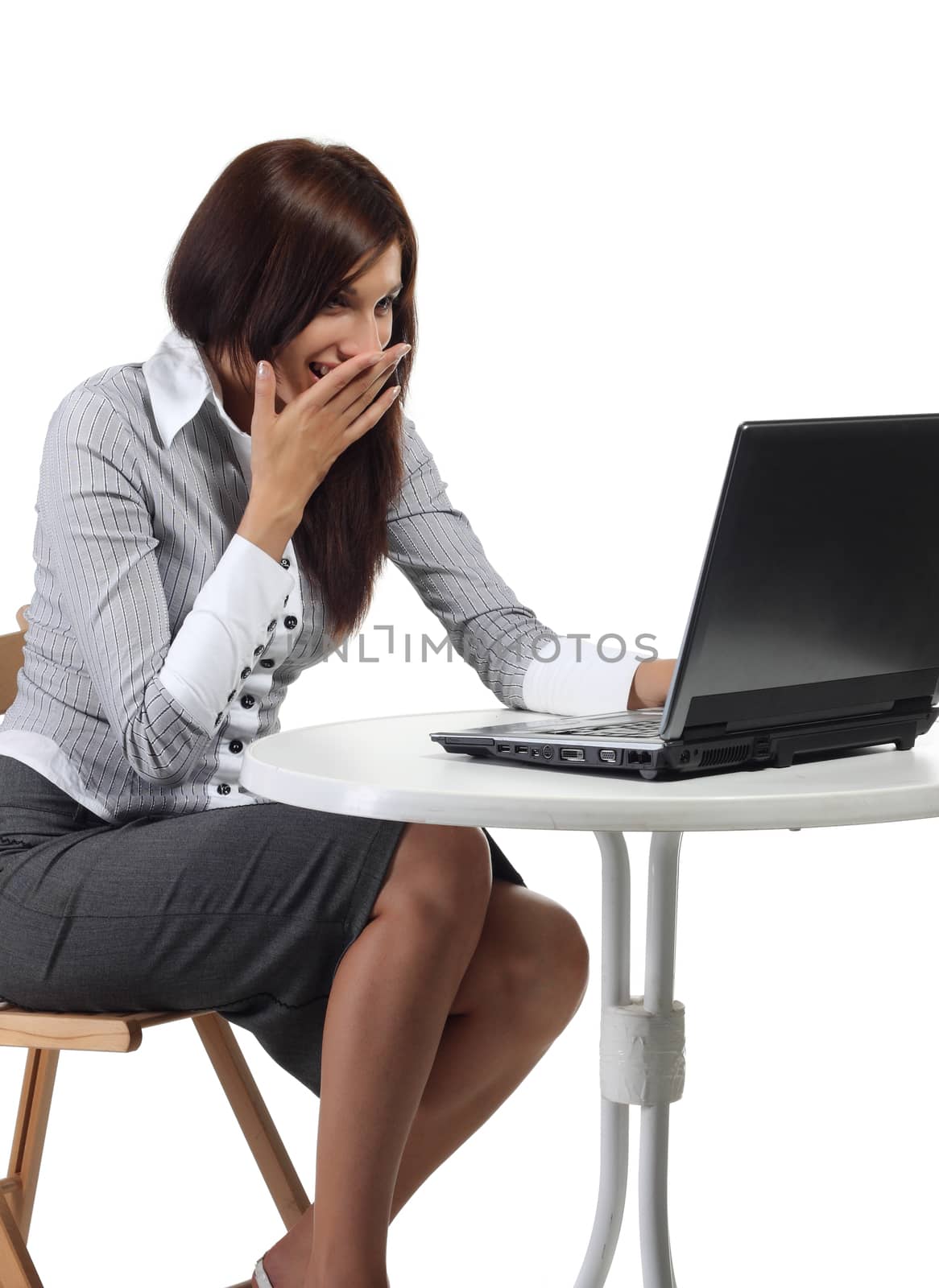 Happy women sitting with computer isolated on the white background