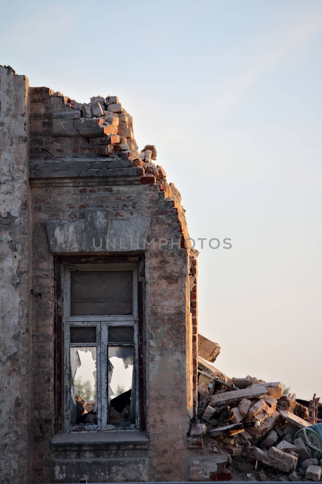 Some broken windows at the wall