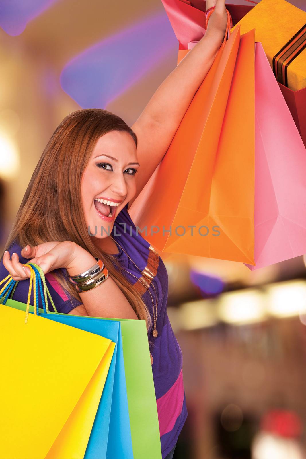 Happy xxl female holds shopping bags. Background digitaly aded, work path