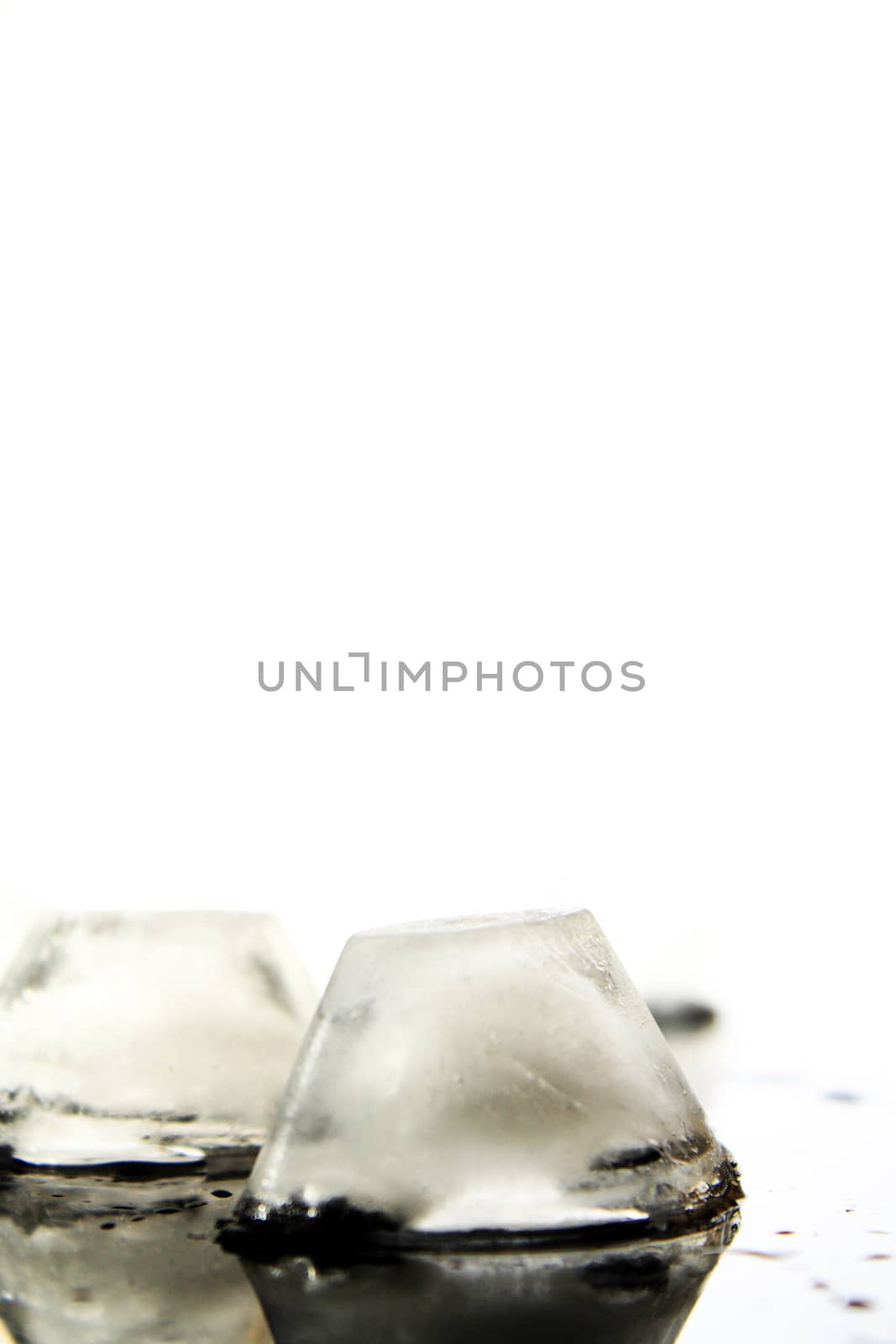 several ice cubes in the form of ground without background 