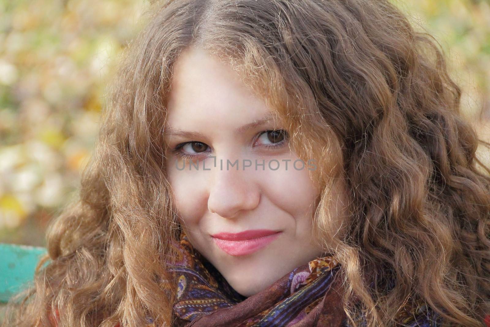 Portrait of thinking young woman with long hair