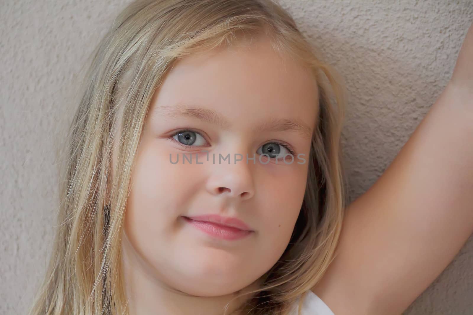 Portrait of beautiful girl with blue eyes