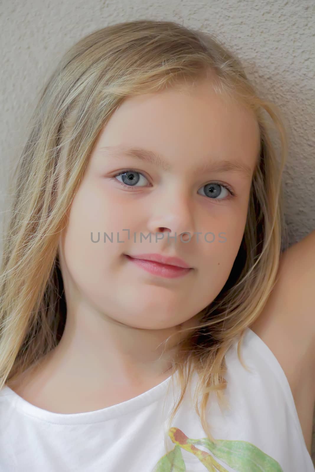 Portrait of beautiful girl with blue eyes