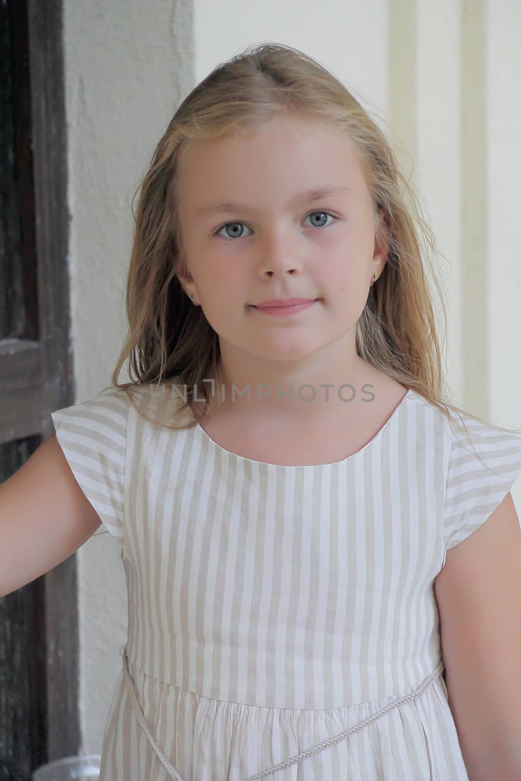 Portrait of beautiful girl with blue eyes