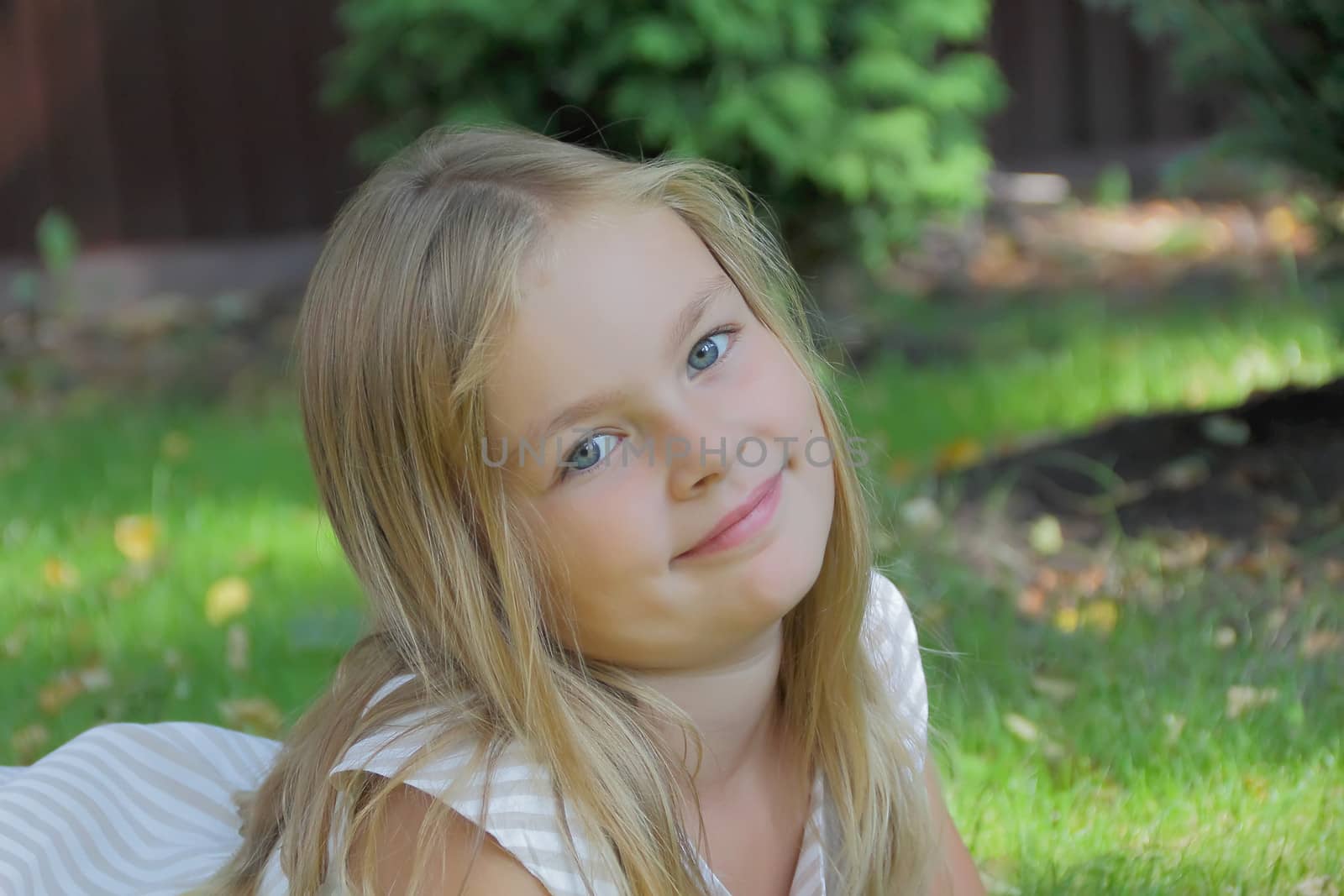 Portrait of beautiful girl with blue eyes