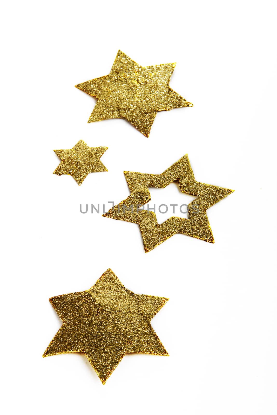 golden christmas stars on white background 