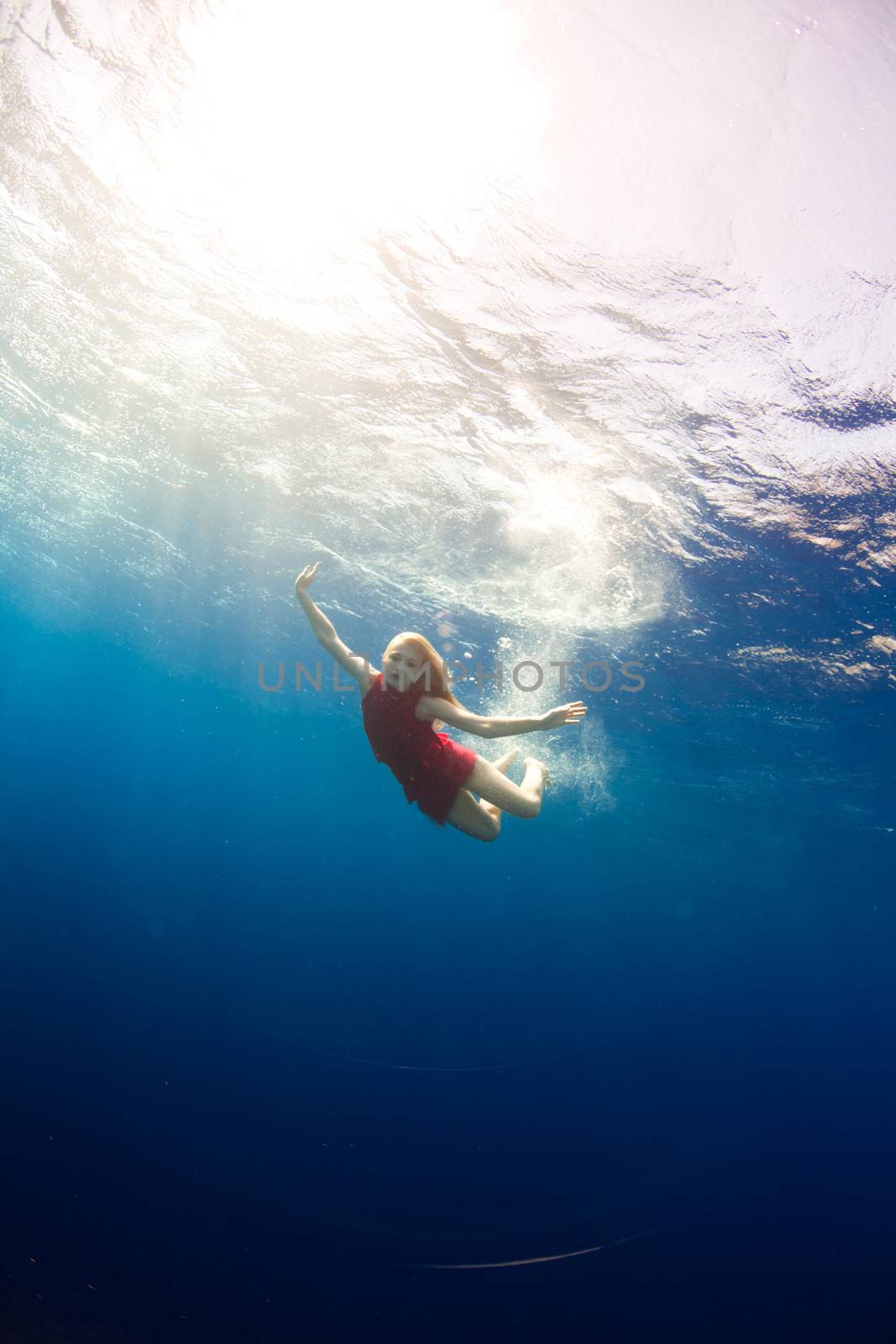 girl diving under the sea by vsurkov