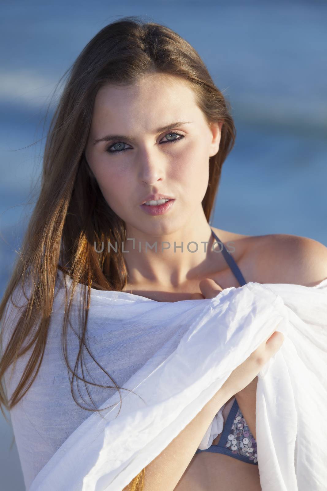 beautiful woman on the beach by bernjuer