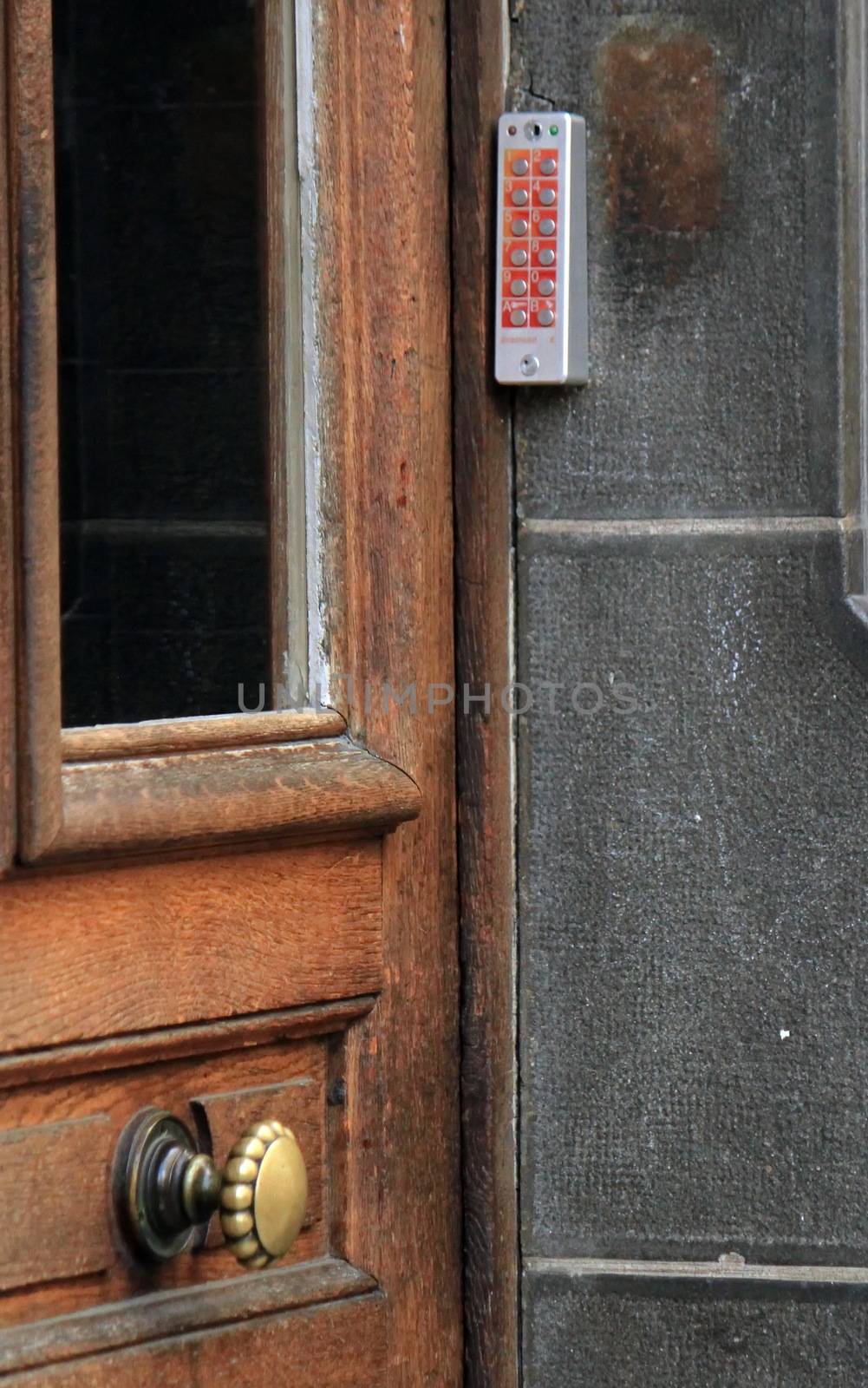 Locked old door with digital code in Geneva, Switzerland