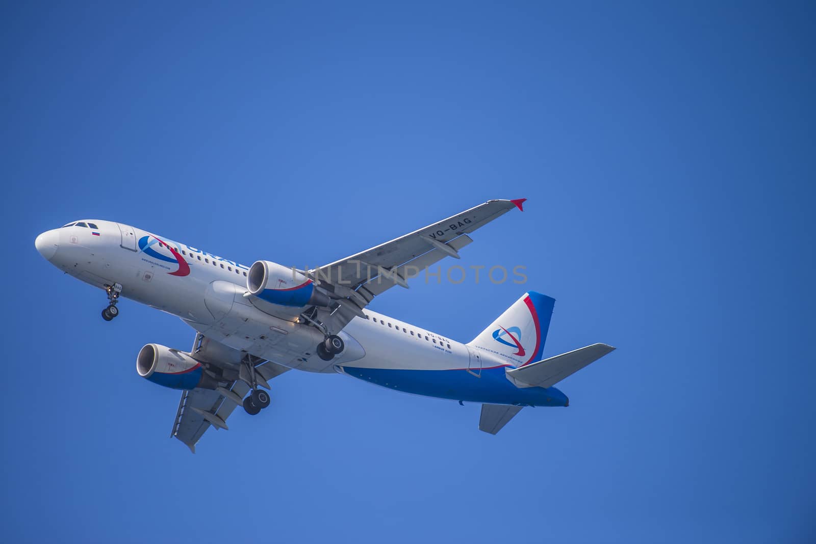 Airbus a320, Ural Airlines, Russia. The pictures of the planes are shot very close an airport just before landing. September 2013.