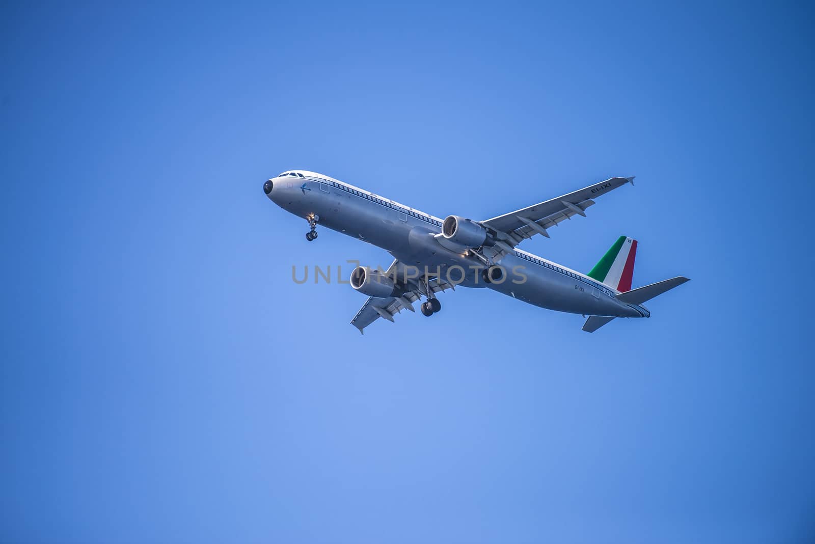 Alitalia, Italy, Ei-Ixi, Airbus a321-112. The pictures of the planes are shot very close an airport just before landing. September 2013.