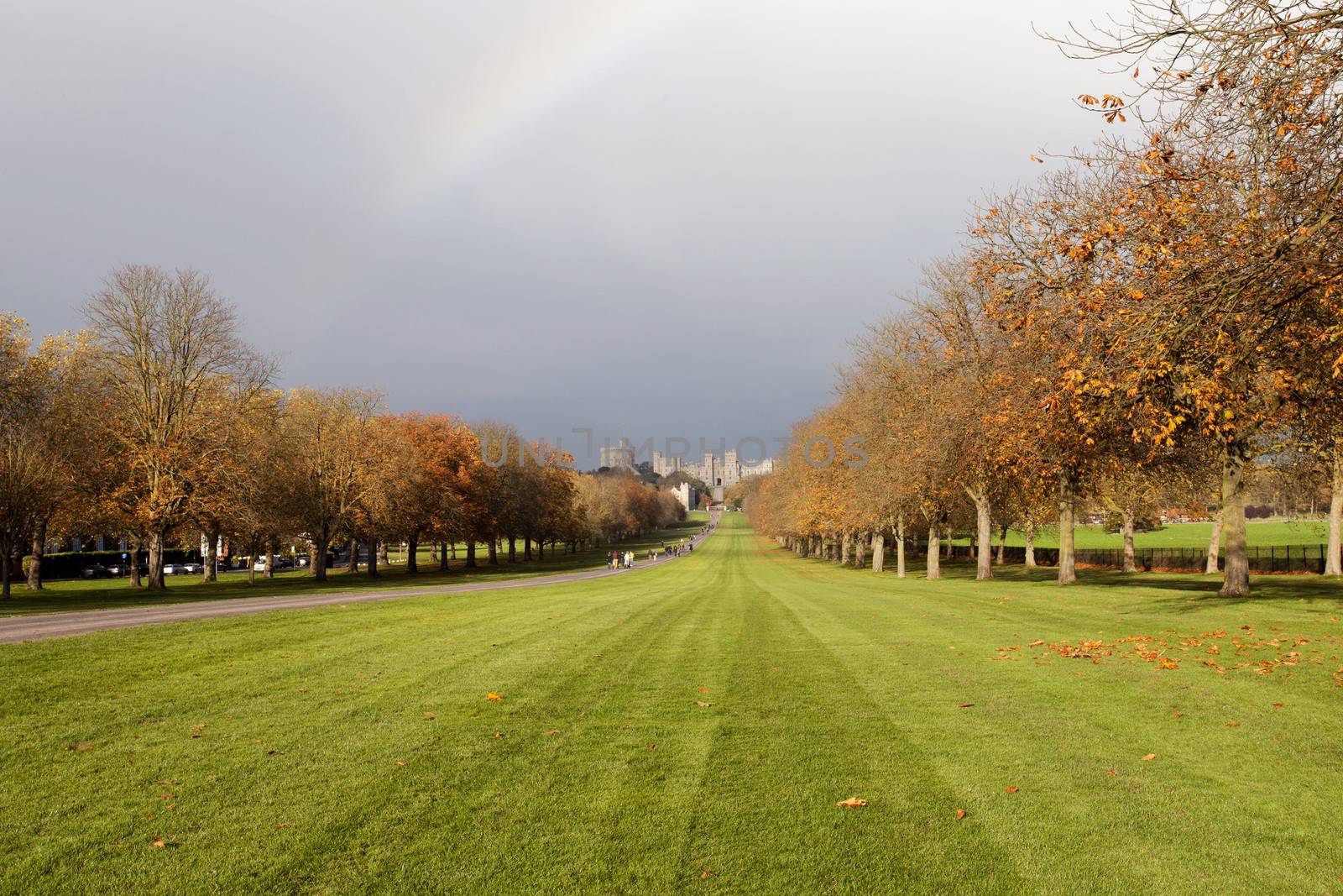A rainbow in the distance looking down the long walk at windsor castle