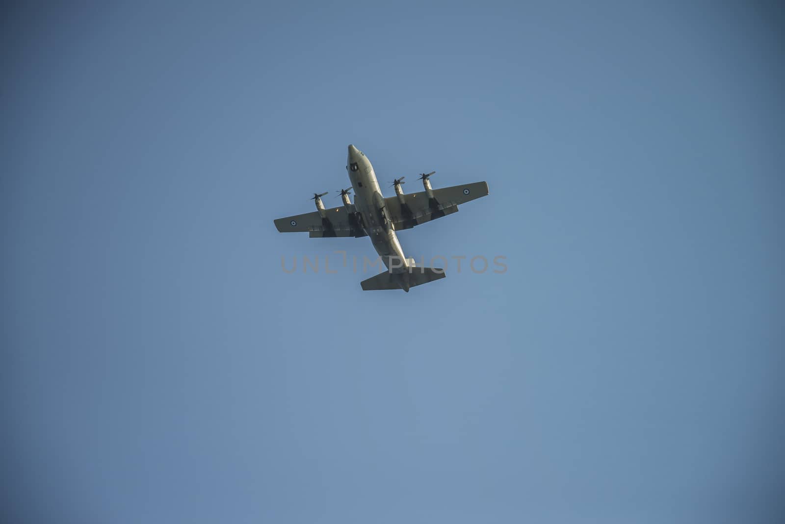 Four-engine propeller aircraft in the air. The pictures of the planes are shot very close an airport just before landing. September 2013.
