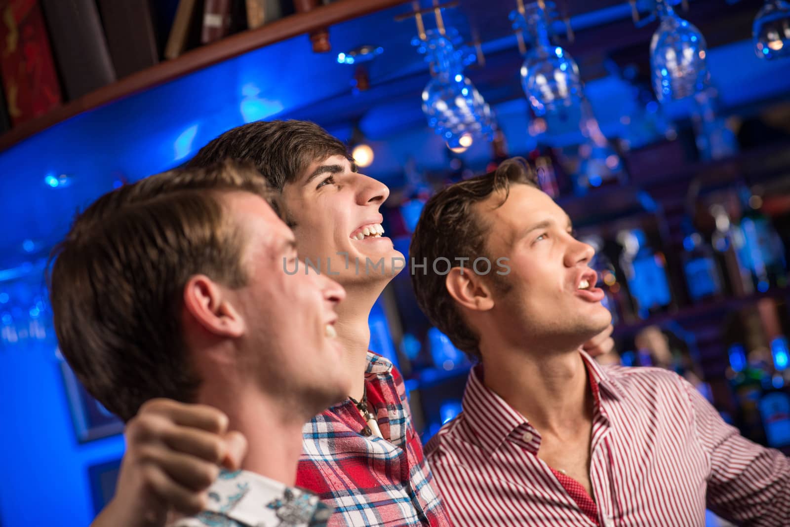 portrait of the fans in the bar by adam121