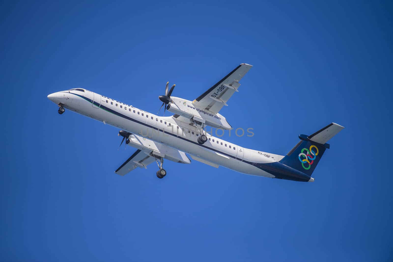 Olympic air de Havilland Canada Dhc-8-402q Sx-Obd, Greece. The pictures of the planes are shot very close an airport just before landing. September 2013.