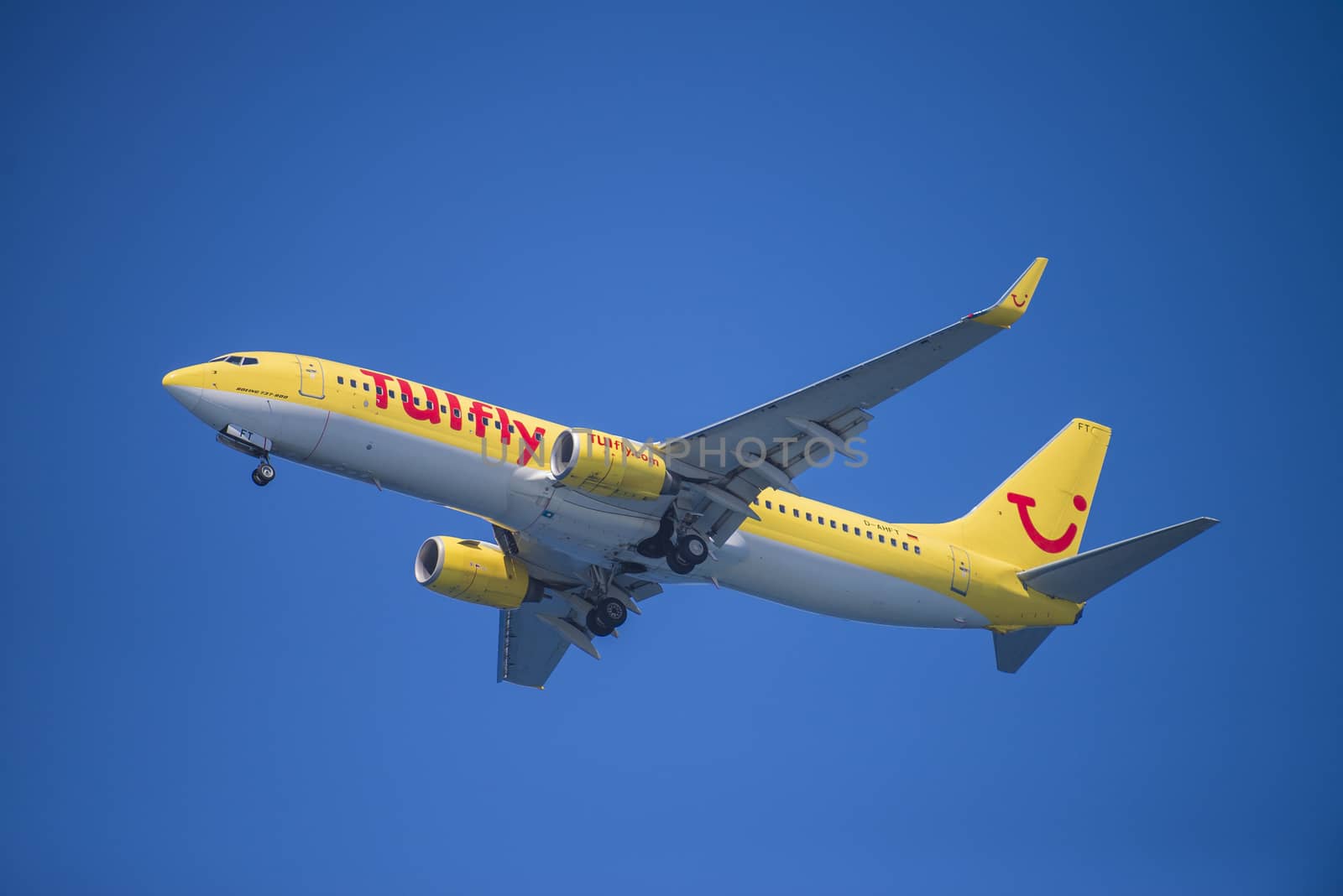 Tuifly, Germany, Boeing 737-800. The pictures of the planes are shot very close an airport just before landing. September 2013.