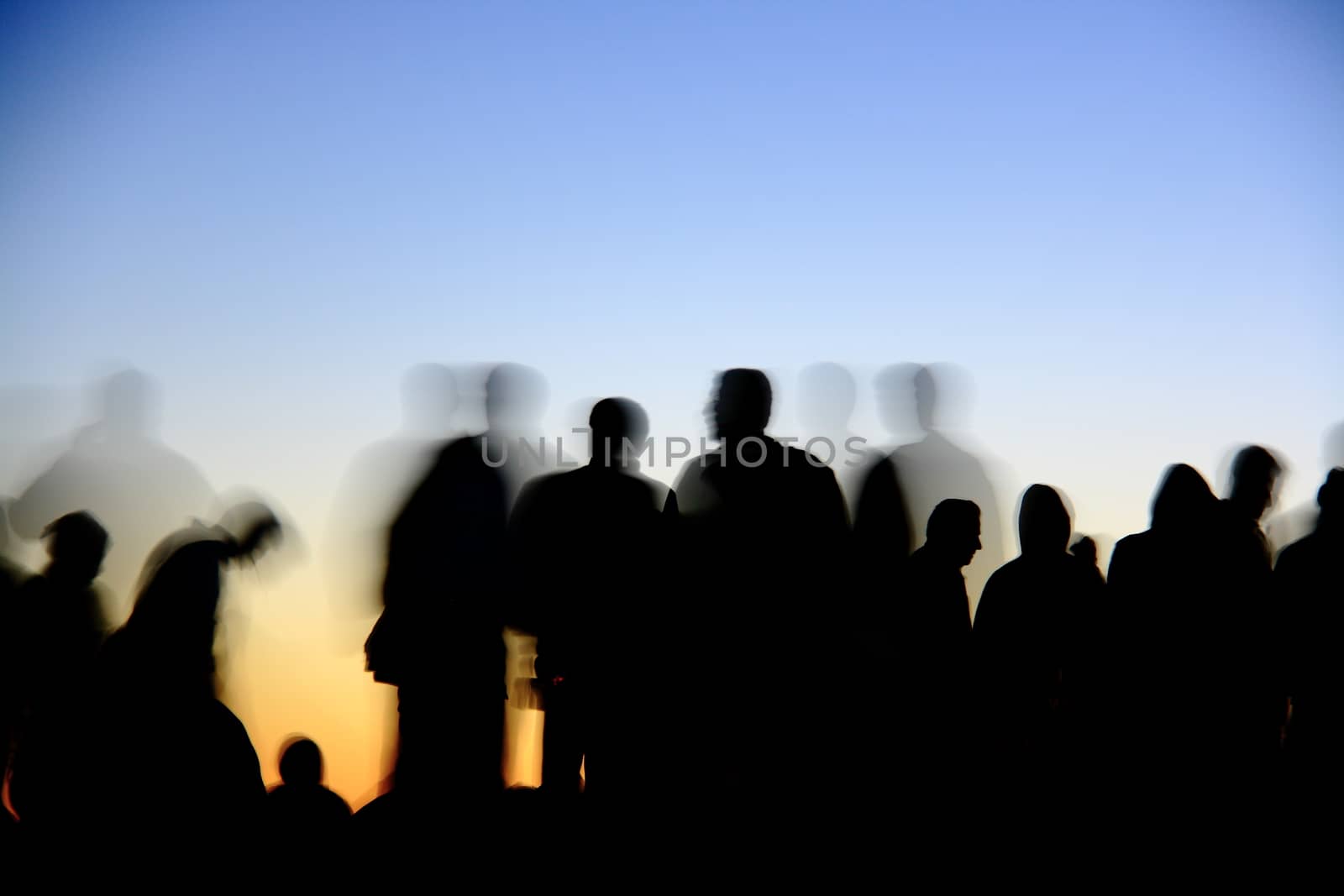 people silhouettes  on nemrut mountain waiting sunrise