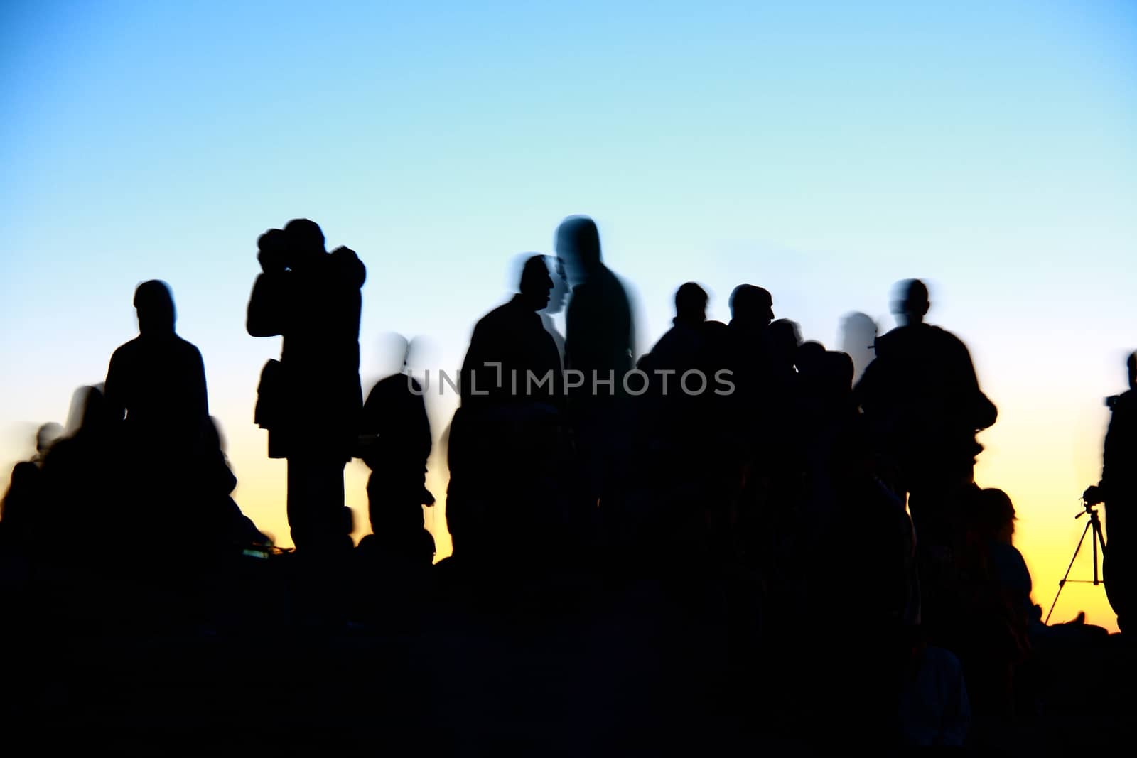 people silhouettes  on nemrut mountain waiting sunrise