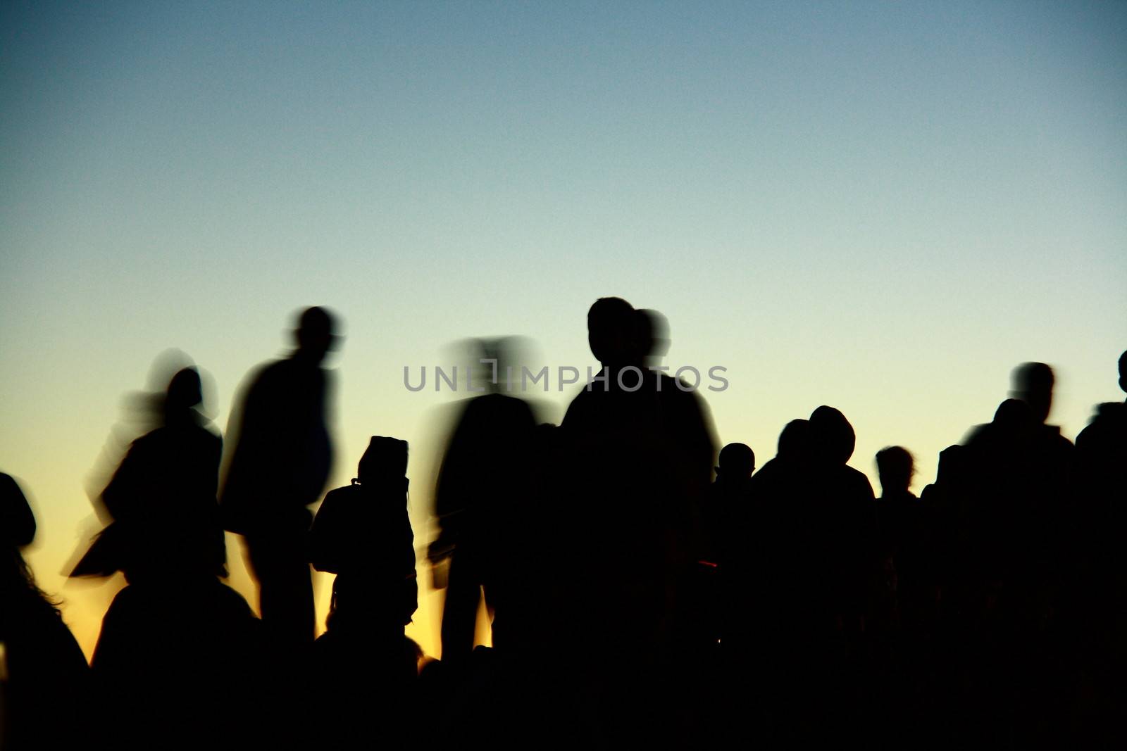 people silhouettes  on nemrut mountain waiting sunrise